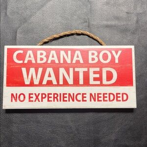 Red and White Cabana Boy Wanted Sign